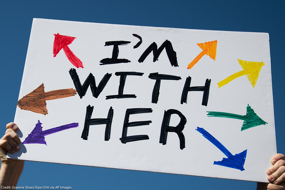 A protest sign that reads, "I'm With Her"