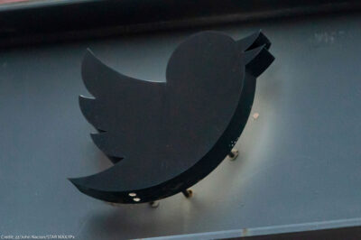 The Twitter logo sign that hangs in front of its New York City headquarters.