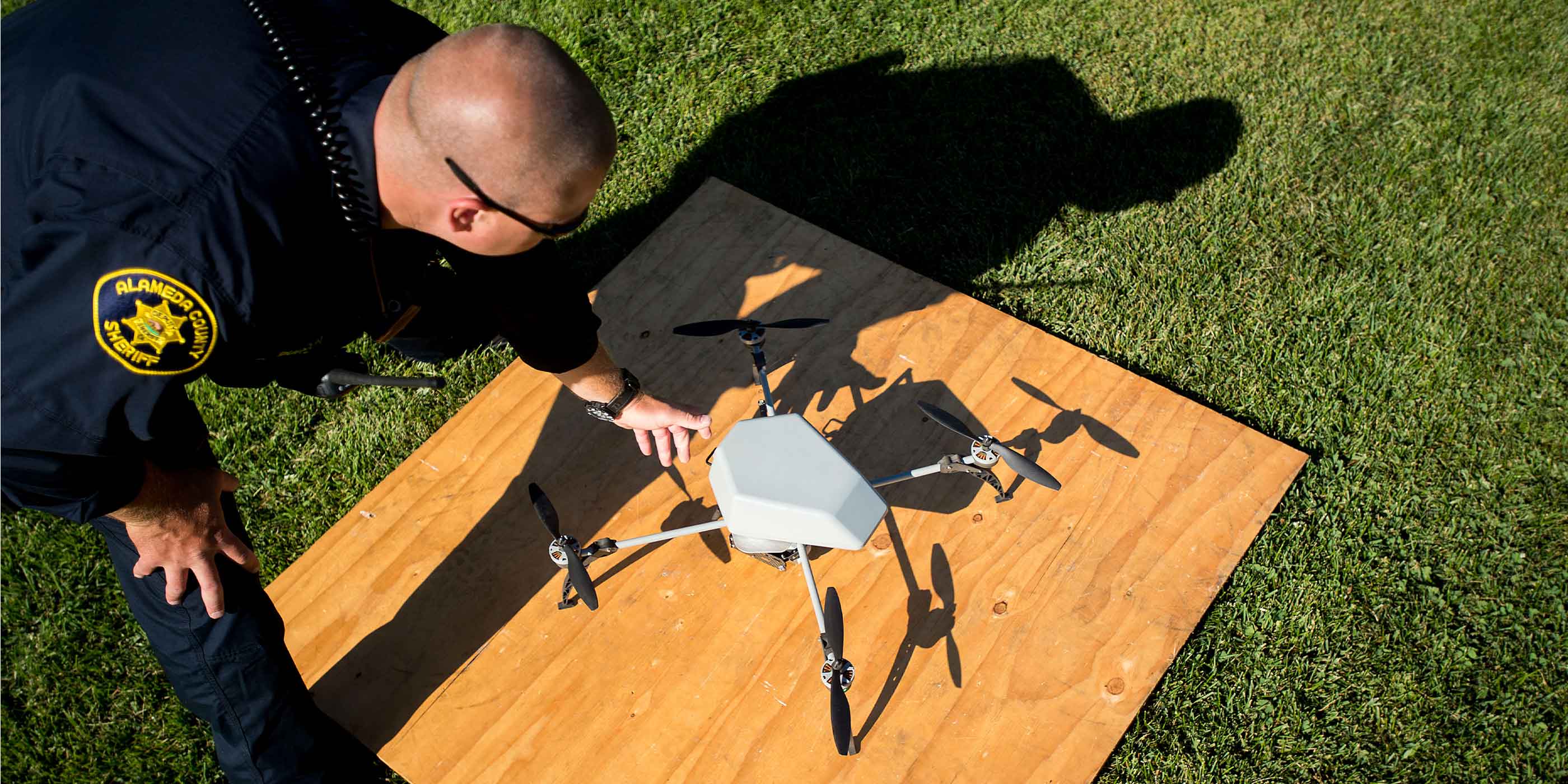 A sheriff's deputy to prepares to fly a drone for an aerial demonstration of the its capabilities.