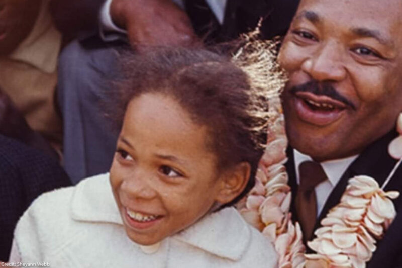 A photo of Sheyann Webb with Dr. Martin Luther King Jr.