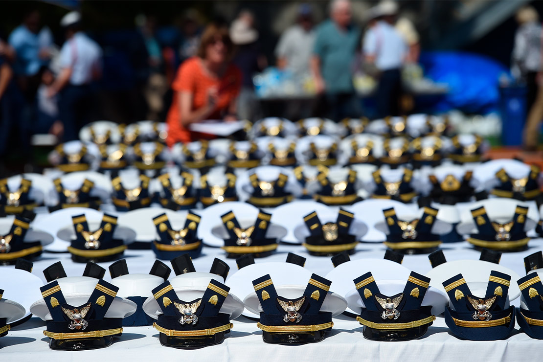 The new hats and shoulder bars arrayed neatly, for US Coast Guard Academy graduates sit on a table before the start of the U.S. Coast Guard Academy's Commencement Exercises.