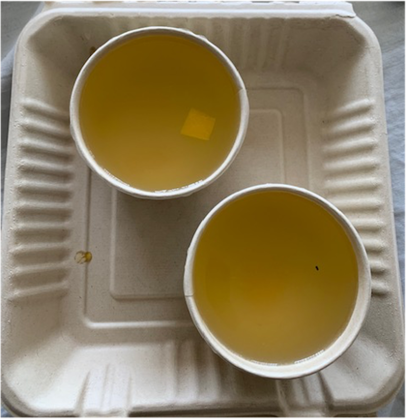 Two small cups of broth.