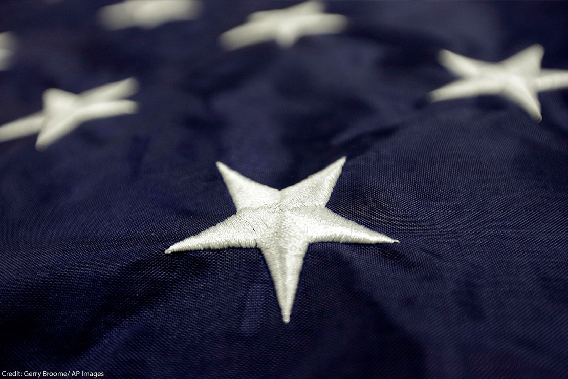 A photo of the stars on the American flag, used as a cover of the ACLU's New Federalism Report.