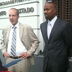 ACLU Executive Director Anthony Romero and baseball legend Carlos Delgado outside offices of Puerto Rico Secretary of State before meeting with government officials