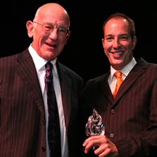 Anthony D. Romero presents Peter B. Lewis with an award in 2006 for his "courage and contributions to the ACLU and our country in the name of freedom and fairness."