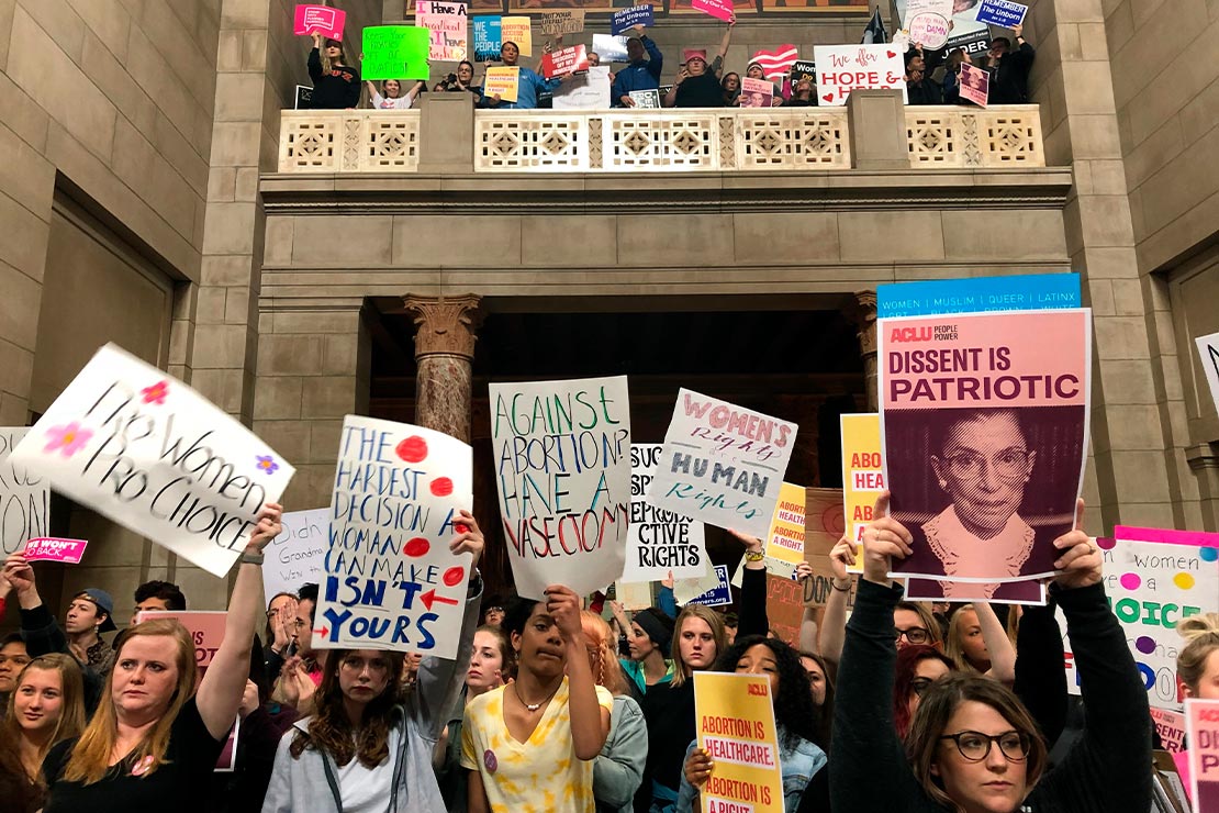 Supporters of abortion rights rally against recently passed restrictions on abortions in the Statehouse rotunda at the Nebraska Capitol in Lincoln, Nebraska.