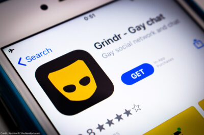 A picture of the Grindr app icon on a cellphone.