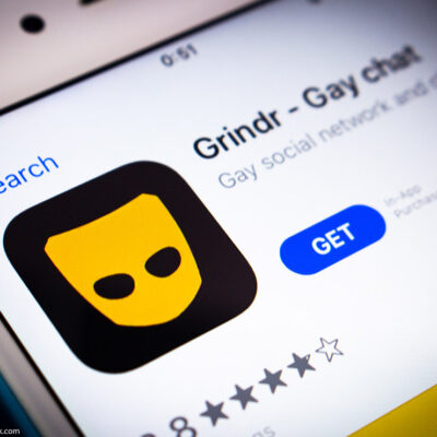 A picture of the Grindr app icon on a cellphone.