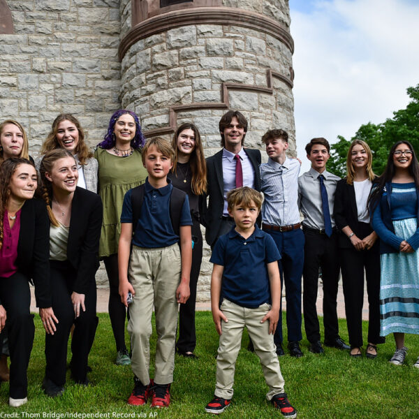 Youth plaintiffs in the climate change lawsuit, Held vs. Montana, pose outside the Lewis and Clark County Courthouse in Helena, Mont., on Monday, June 12, 2023.