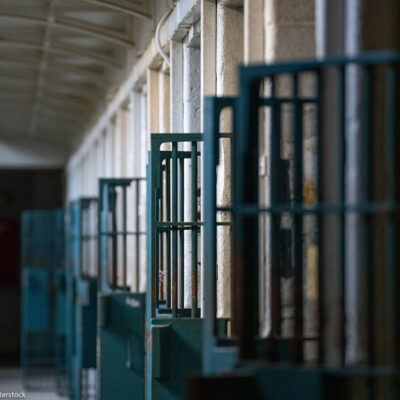 A row of prison doors.