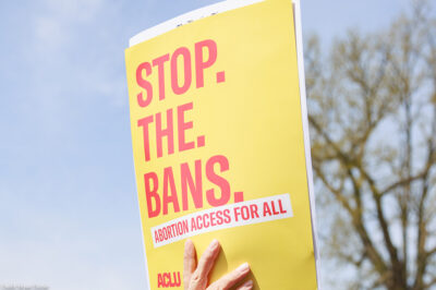 A protest sign that says Stop the Bans.
